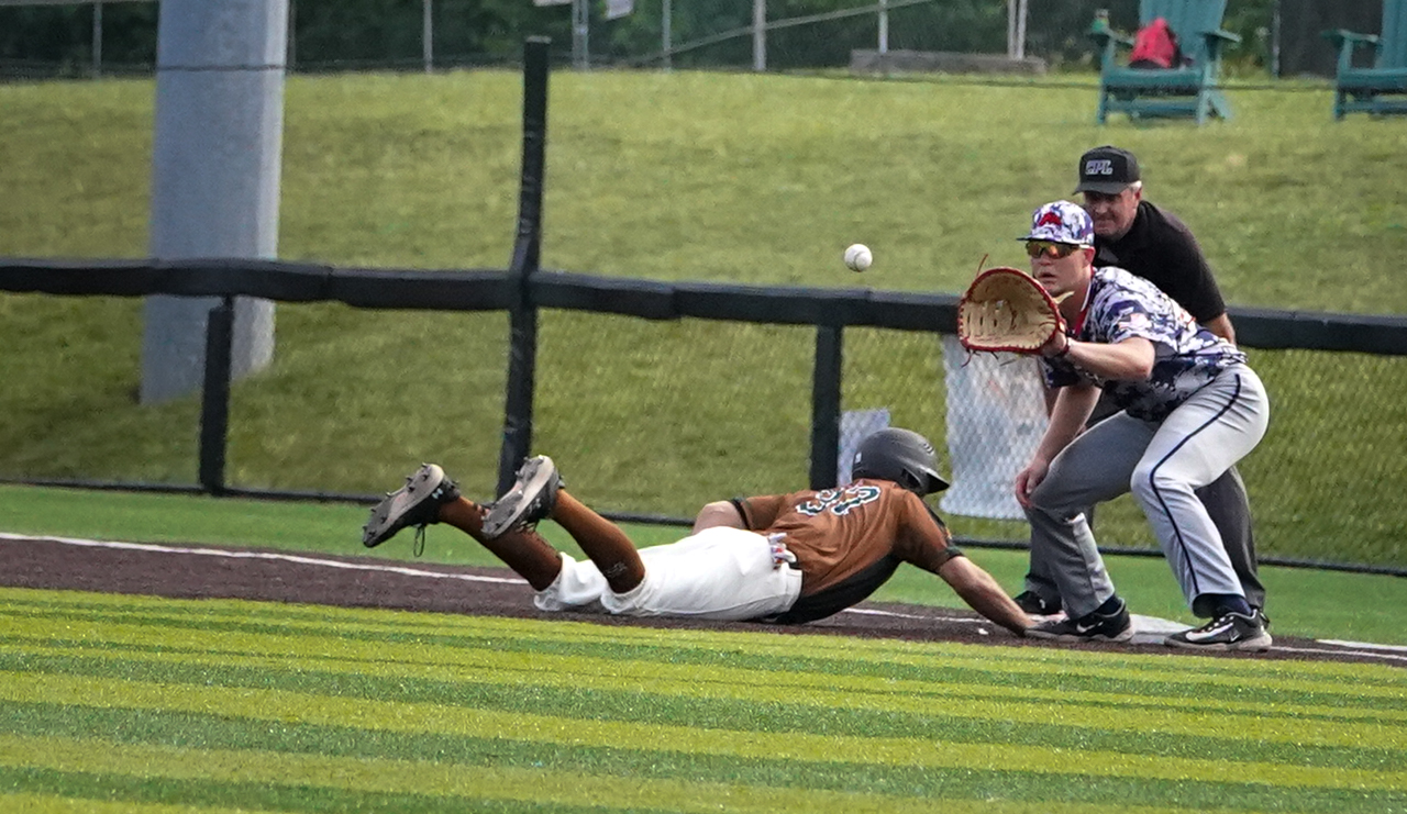 Boone Bigfoots base runner gets back to first vs. Martinsville on June 25