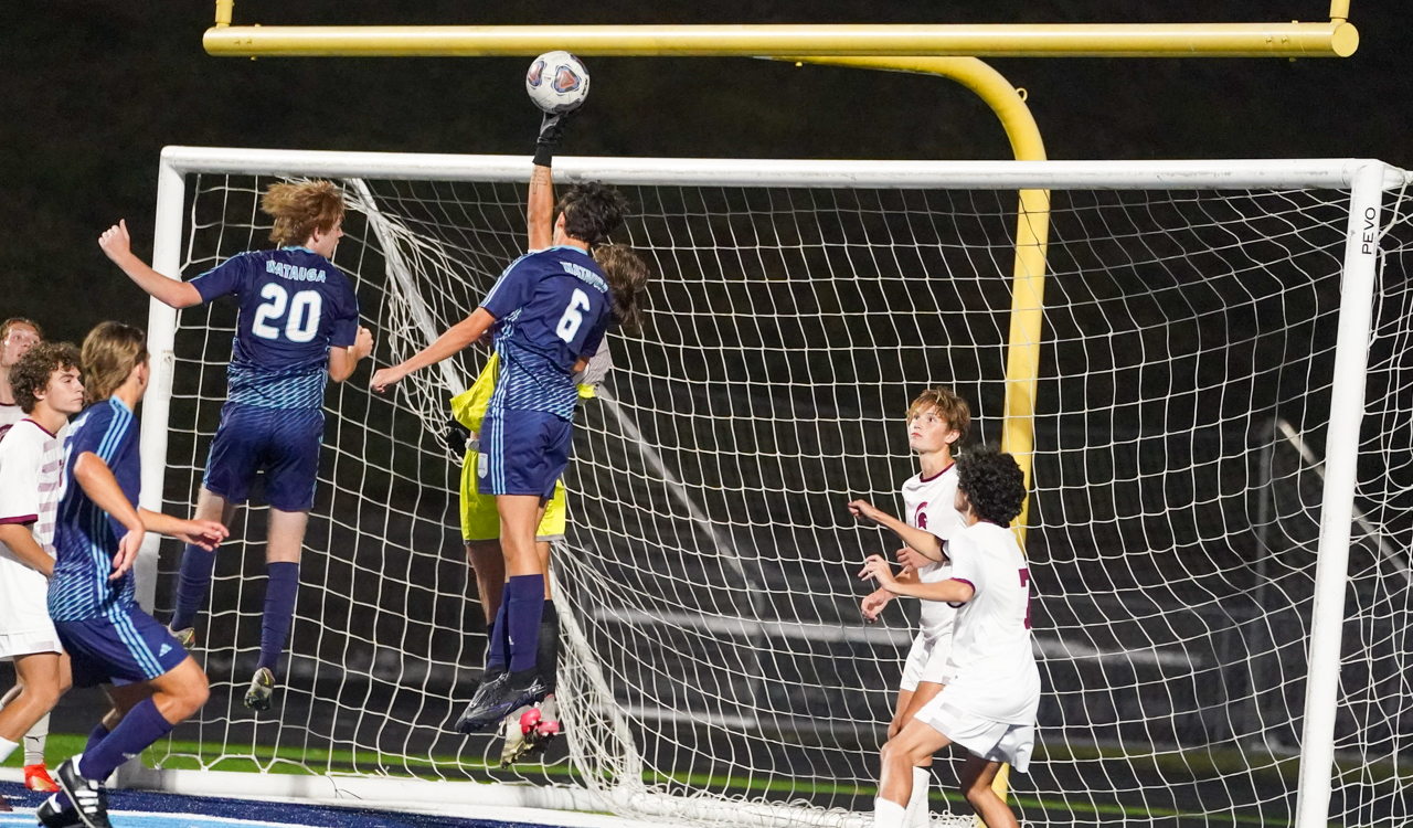 The South Caldwell goalkeeper deflects a Watauga shot over the bar for a non-goal on Sept. 21 at Jack Groce Stadium. Photographic image by David Rogers.